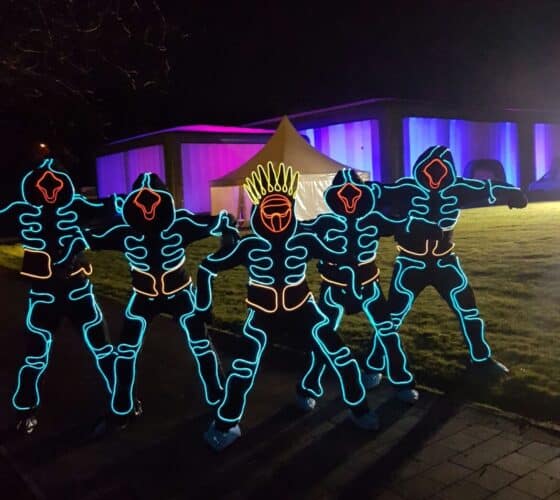 Glow bot dancers